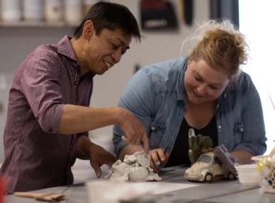 Ceramic student working on craft