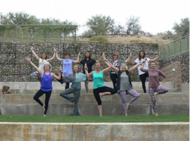 Yoga students in a group pose